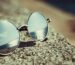 silver framed hippie sunglasses on concrete